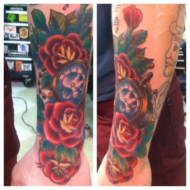 Conor McGregor pocket watch and rose tattoos on his forearm