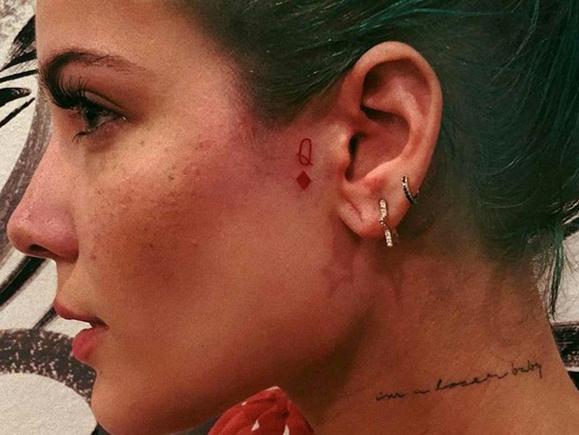 Halsey tattoos: Neck and face tattoos