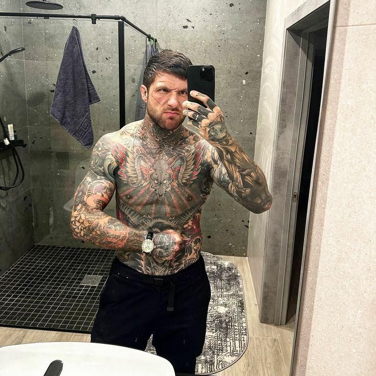 Alex Terrible bathroom mirror tattoos
