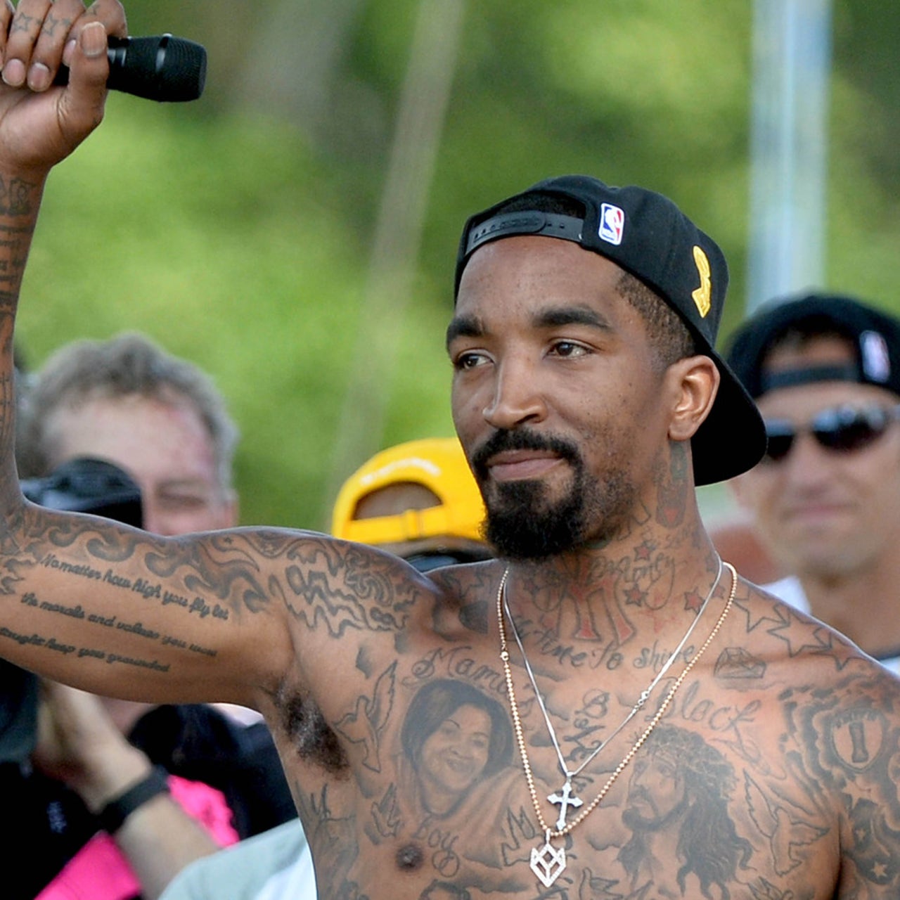 J.R. Smith tattoos: different high-resolution outdoor photograph showing the overall body coverage