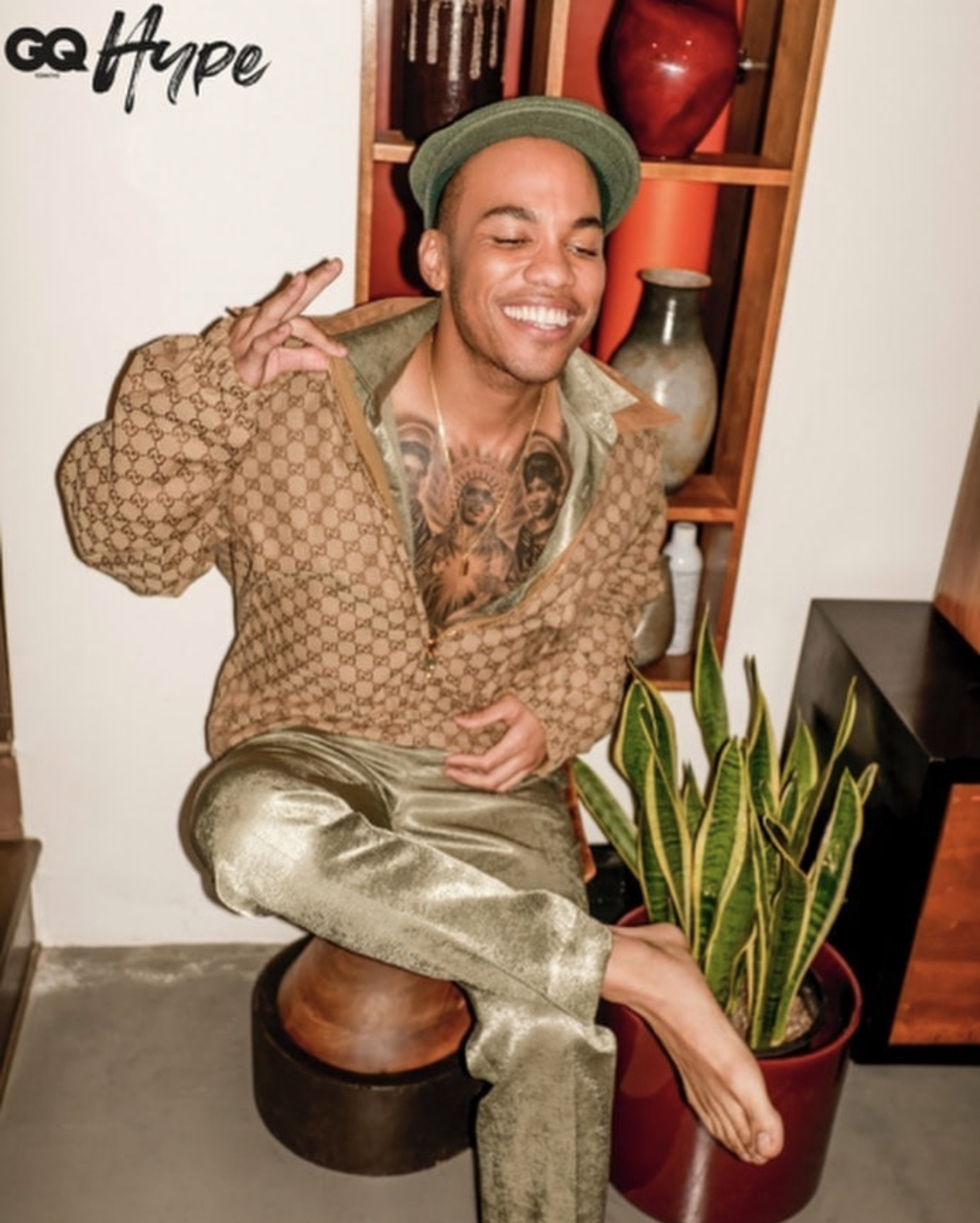 Anderson Paak chest portraits tattoo