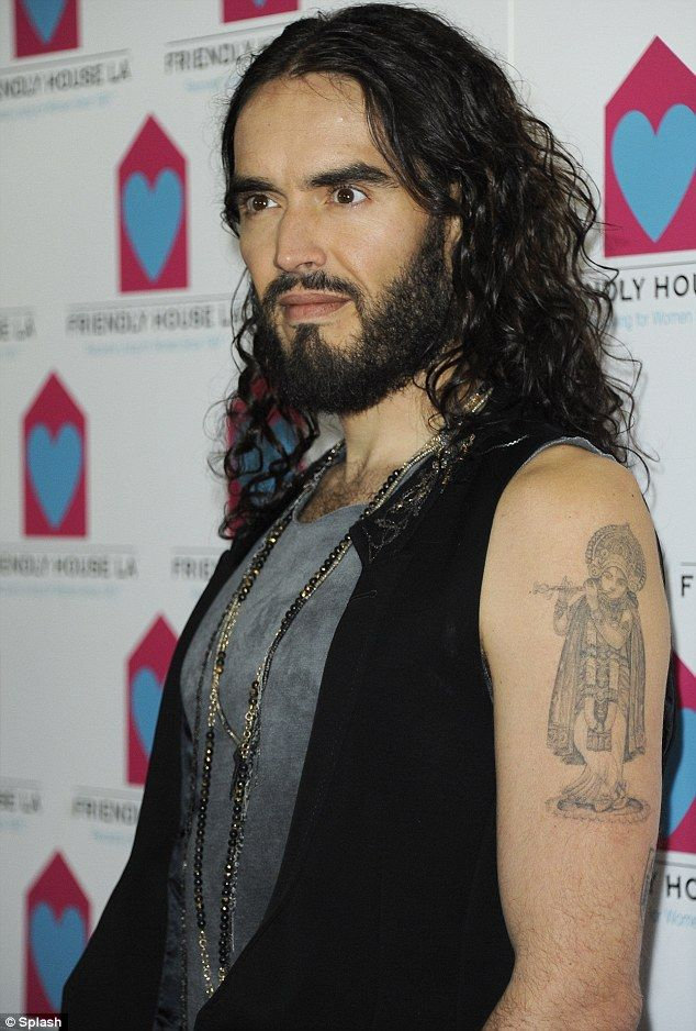 Russell Brand Krishna religious upper arm tattoo