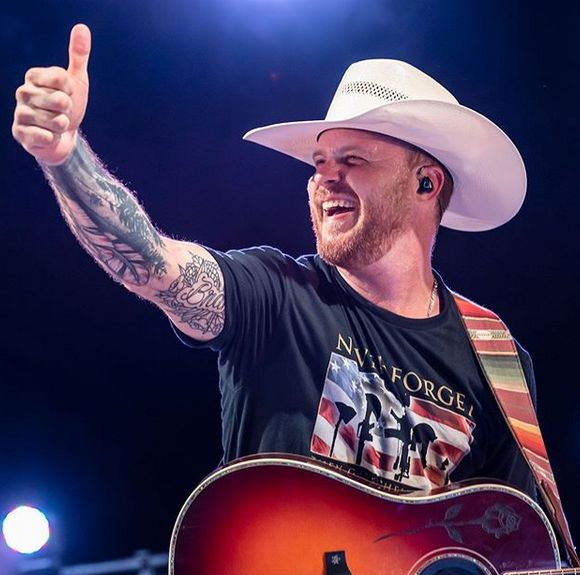 Cody Johnson tattoos: Brandi lettering and the detailed right-arm sleeve