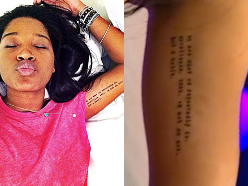 Keke Palmer tattoos: Aristotle quotation tattoo on Keke Palmer’s inner arm