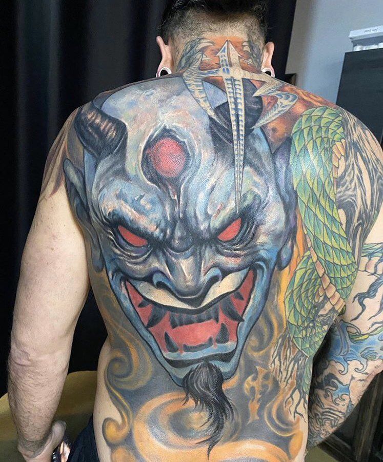 Jeff Hardy full back tattoo with devil, flames and snake