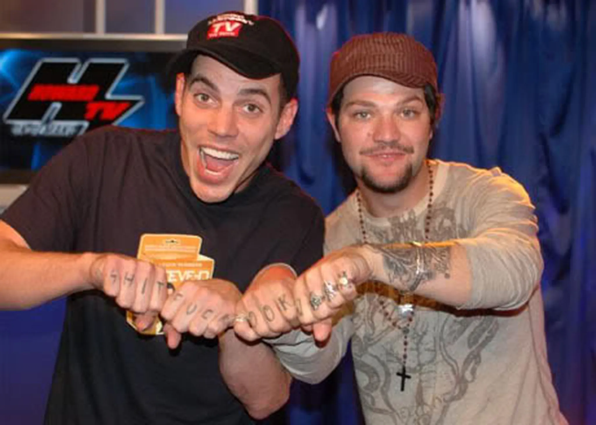 Bam Margera finger lettering and hand tattoos