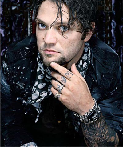 Bam Margera showing Book Worm finger lettering