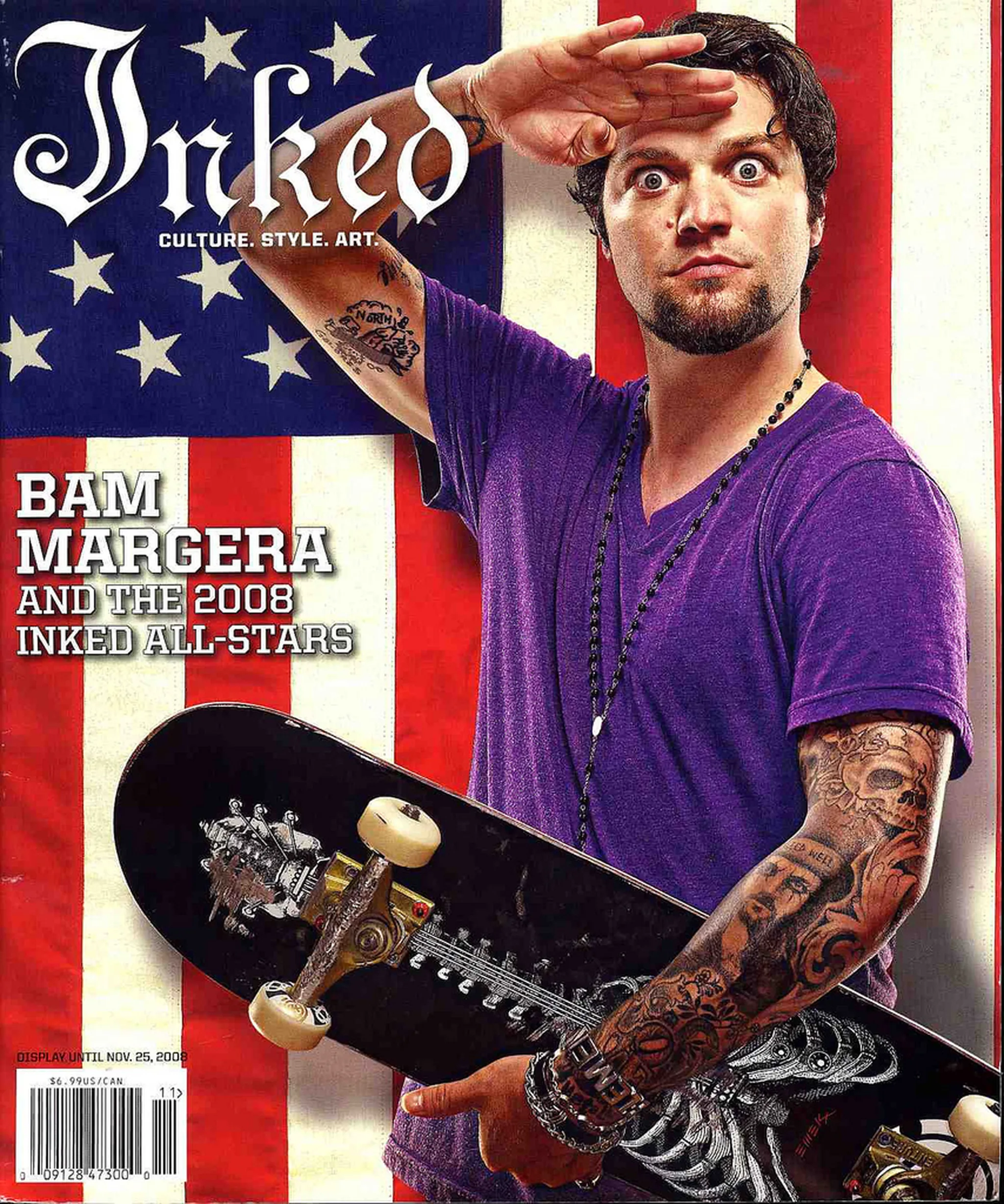Bam Margera showing his tattooed arms and skate-era ink