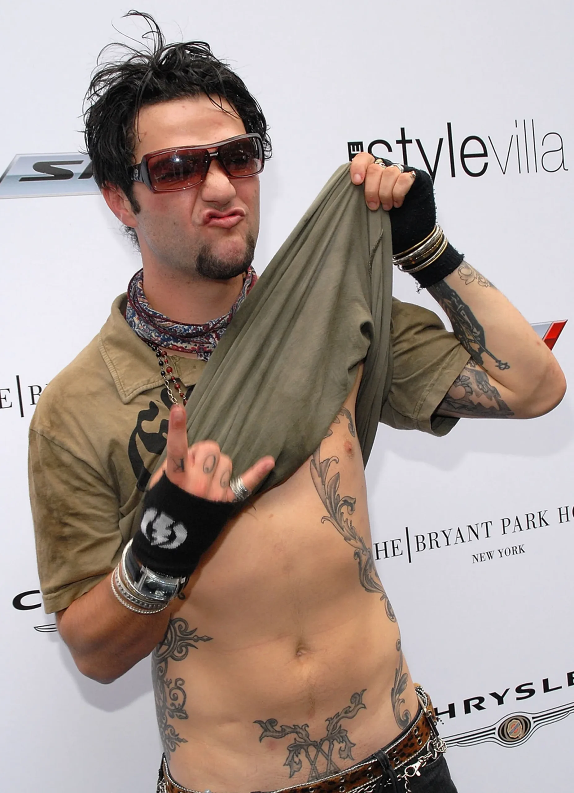 Bam Margera torso, side and arm tattoos
