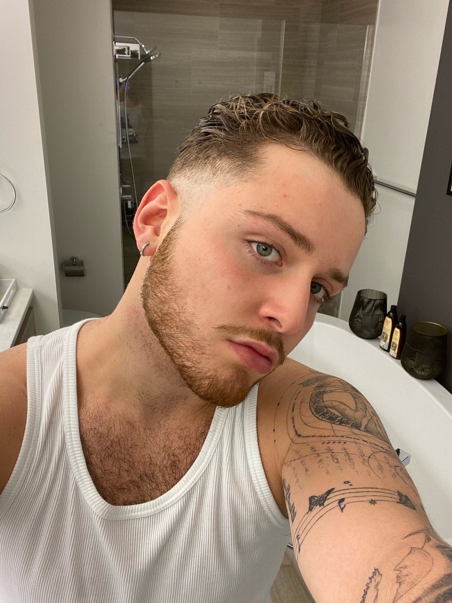 Bazzi shoulder and arm tattoos