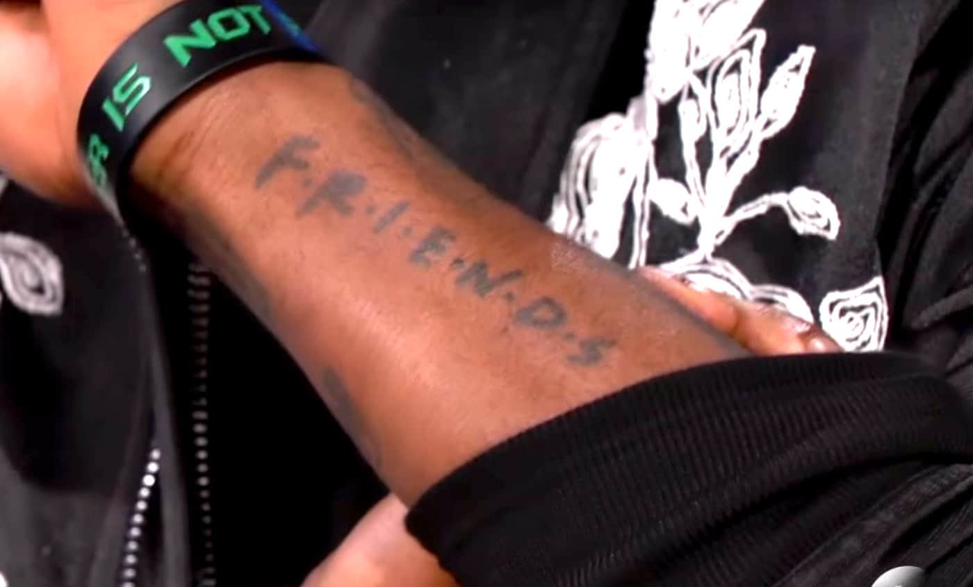 Kyrie Irving tattoos: separate arm photograph showing the Friends logo in its television-style lettering