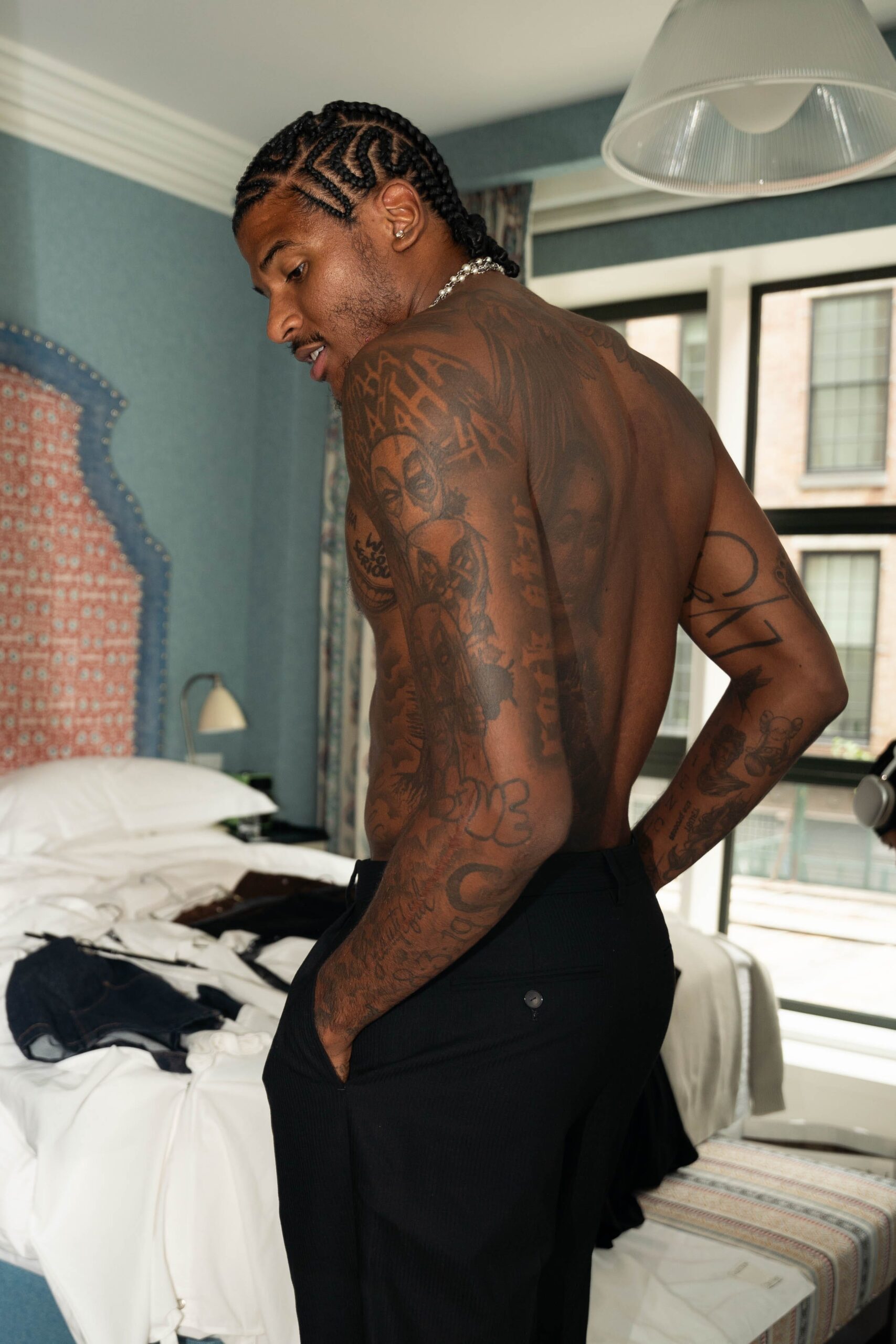 Jalen Green tattoos: large sharp shirtless portrait showing the back, arms and layered tattoo coverage
