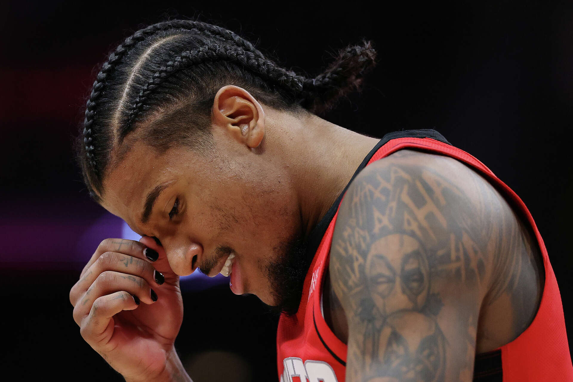 Jalen Green tattoos: distinct high-resolution game photograph showing the arm and hand tattoos under real playing conditions