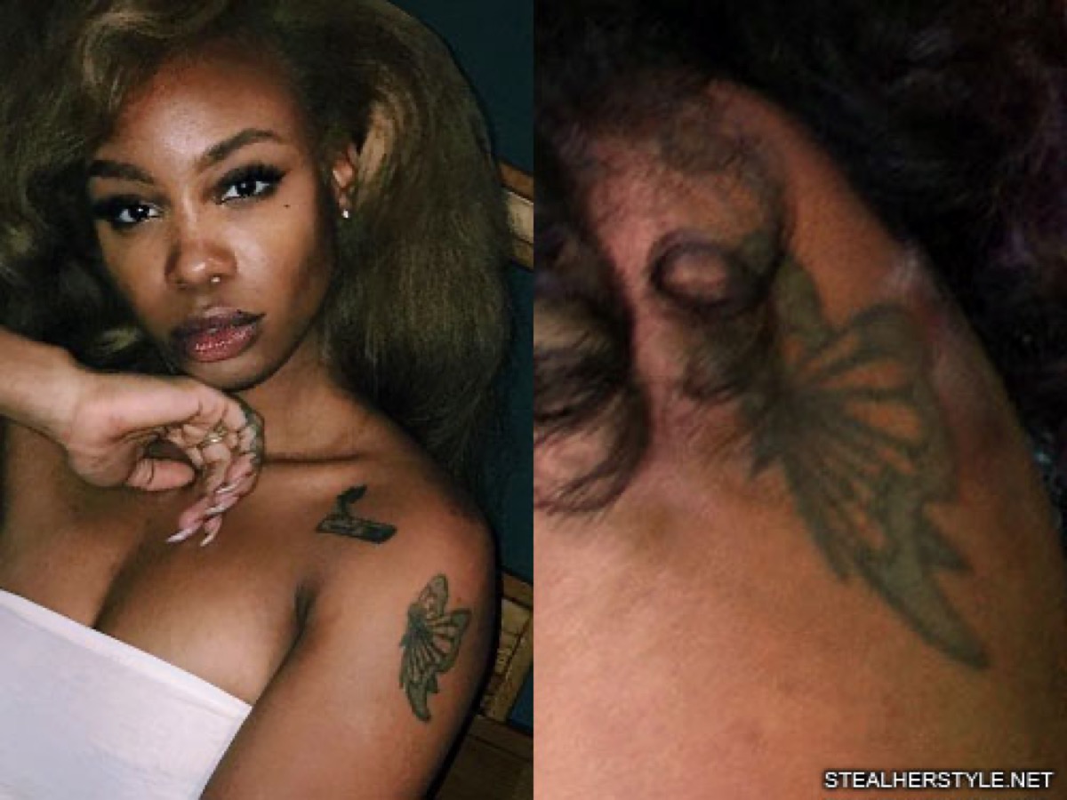 SZA tattoos: clear close-up of SZA’s butterfly upper-arm tattoo