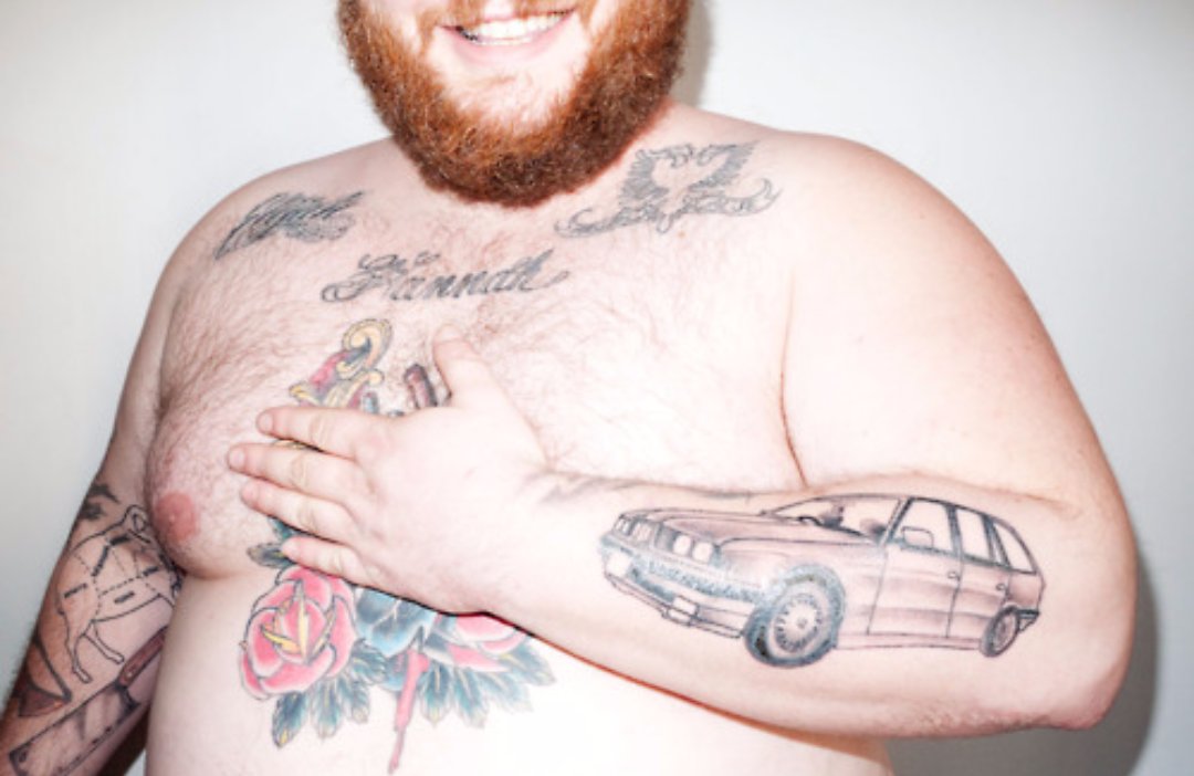 Action Bronson tattoos: 1995 BMW 5 Series forearm tattoo