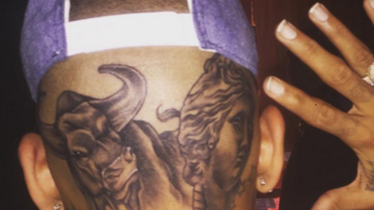 Chris Brown showing the bull and woman's-face tattoo across the back of his head