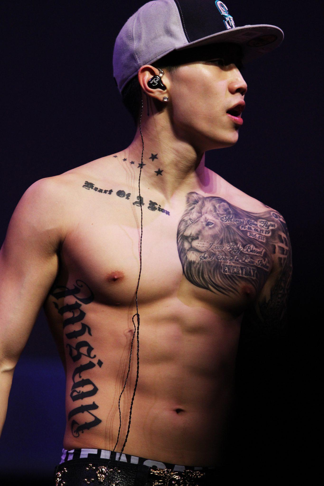 Jay Park tattoos: lion chest tattoo and chest lettering