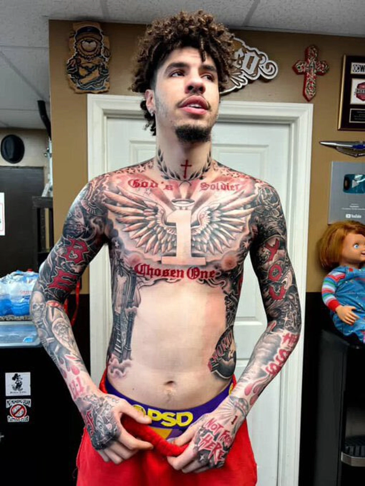 LaMelo Ball tattoos: God’s Soldier and Chosen One chest lettering
