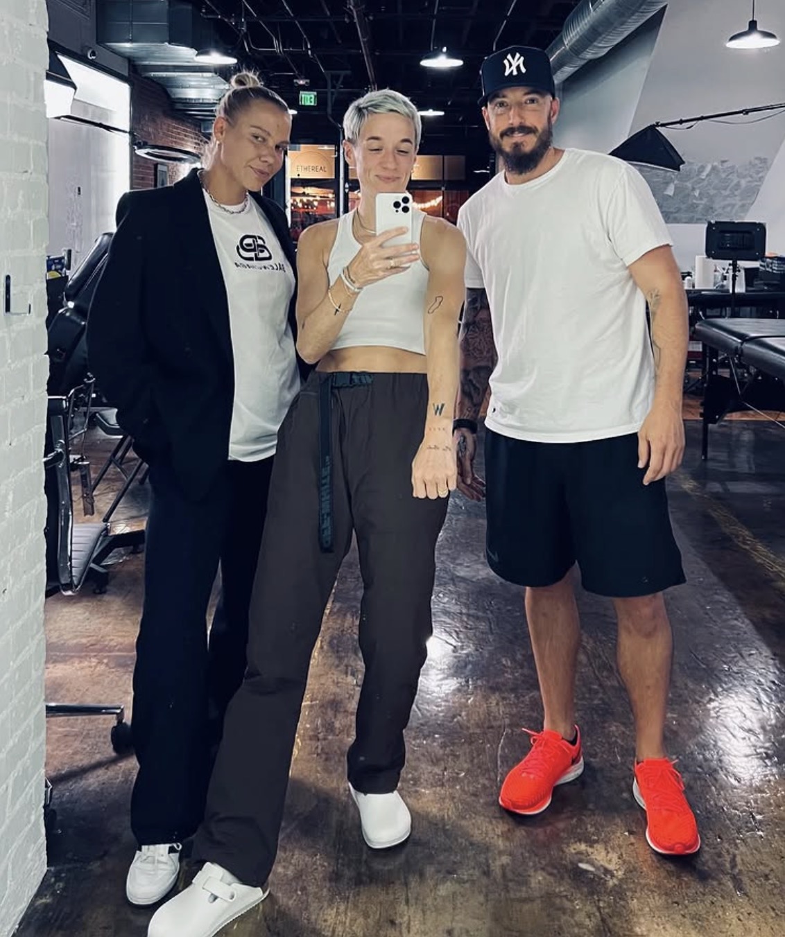 Megan Rapinoe tattoos: different high-resolution tattoo studio photograph showing the hand and wrist work