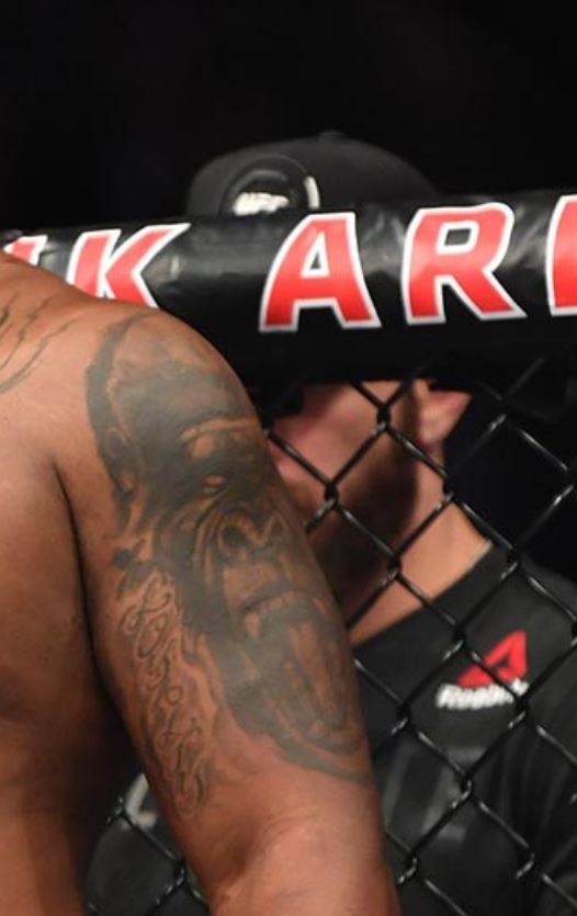 Derrick Lewis left arm gorilla tattoo
