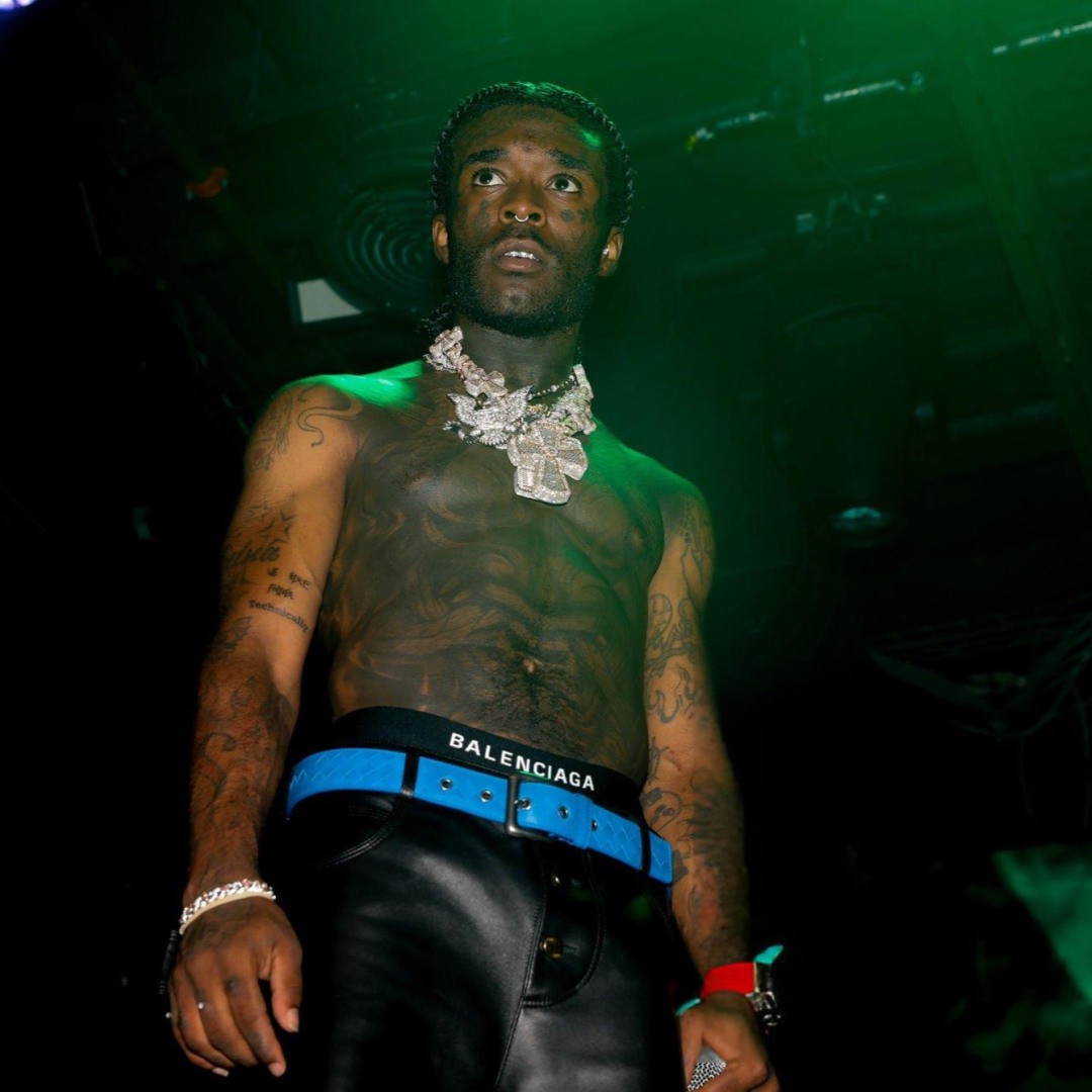 Lil Uzi Vert facial symbols and torso tattoos