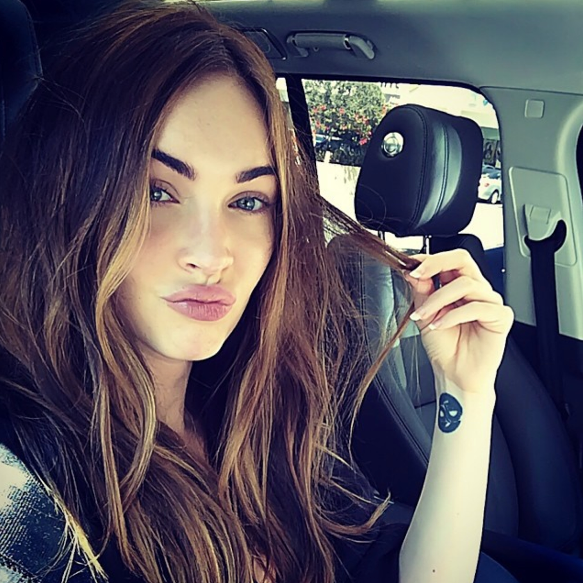 Megan Fox’s yin-yang wrist tattoo