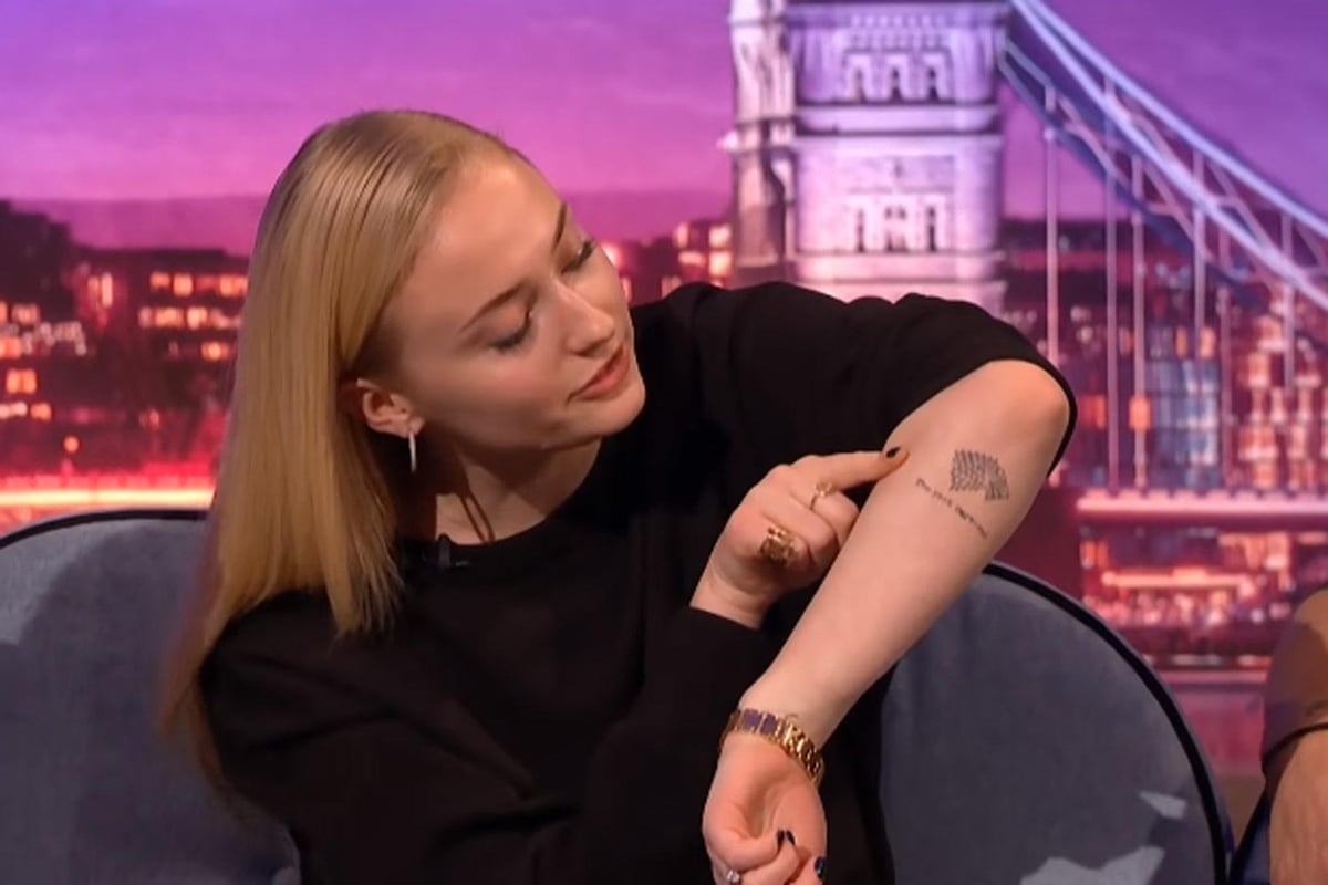 Sophie Turner tattoos: direwolf and The pack survives