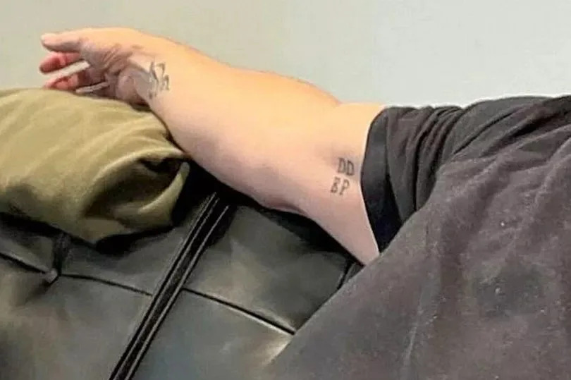 Gary Barlow children initials arm tattoo