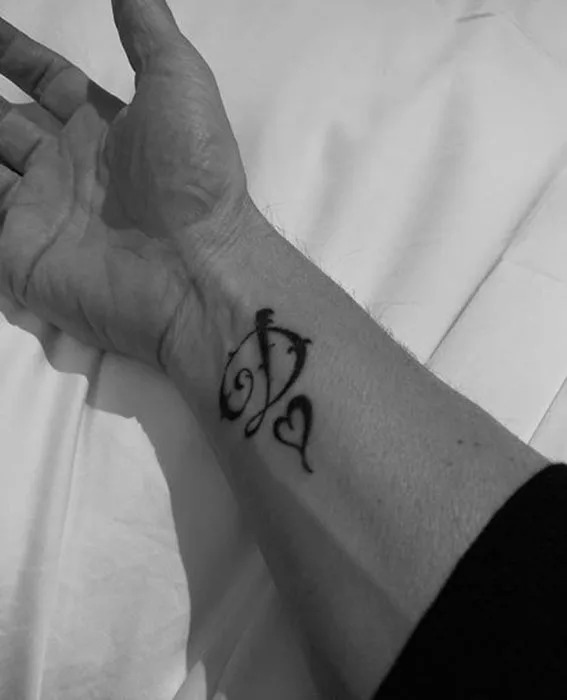 Gary Barlow Dawn heart wrist tattoo