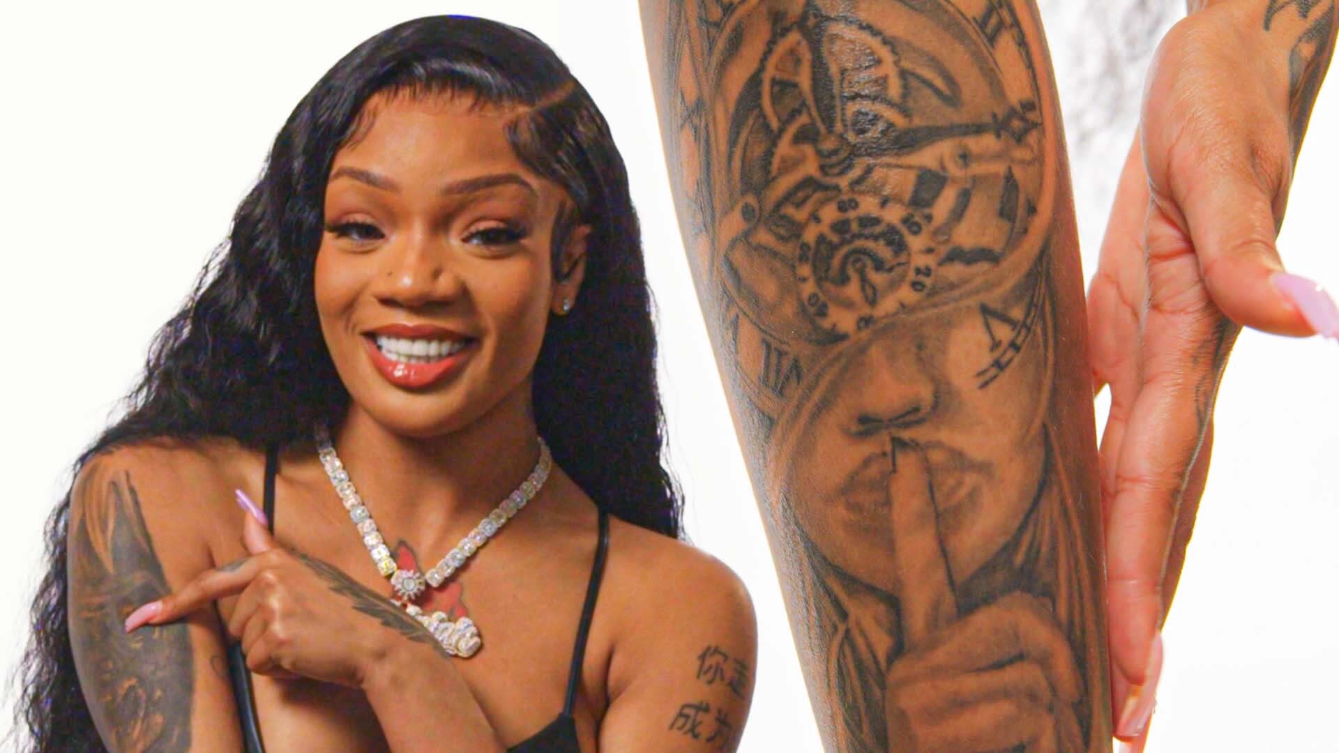 GloRilla showing her hand and chest tattoos during the GQ Tattoo Tour