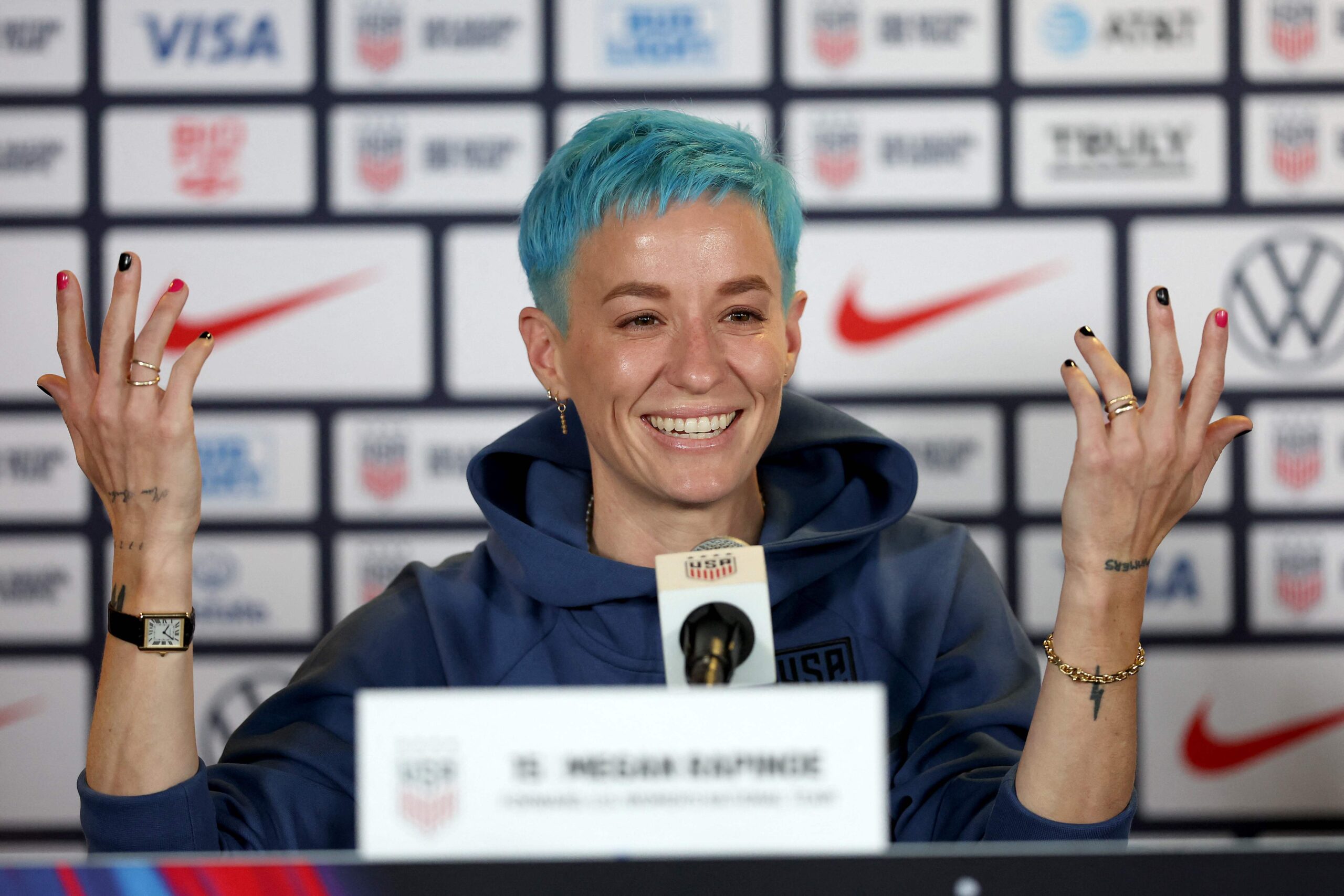 Megan Rapinoe tattoos: different large editorial image showing the smaller arm tattoo details