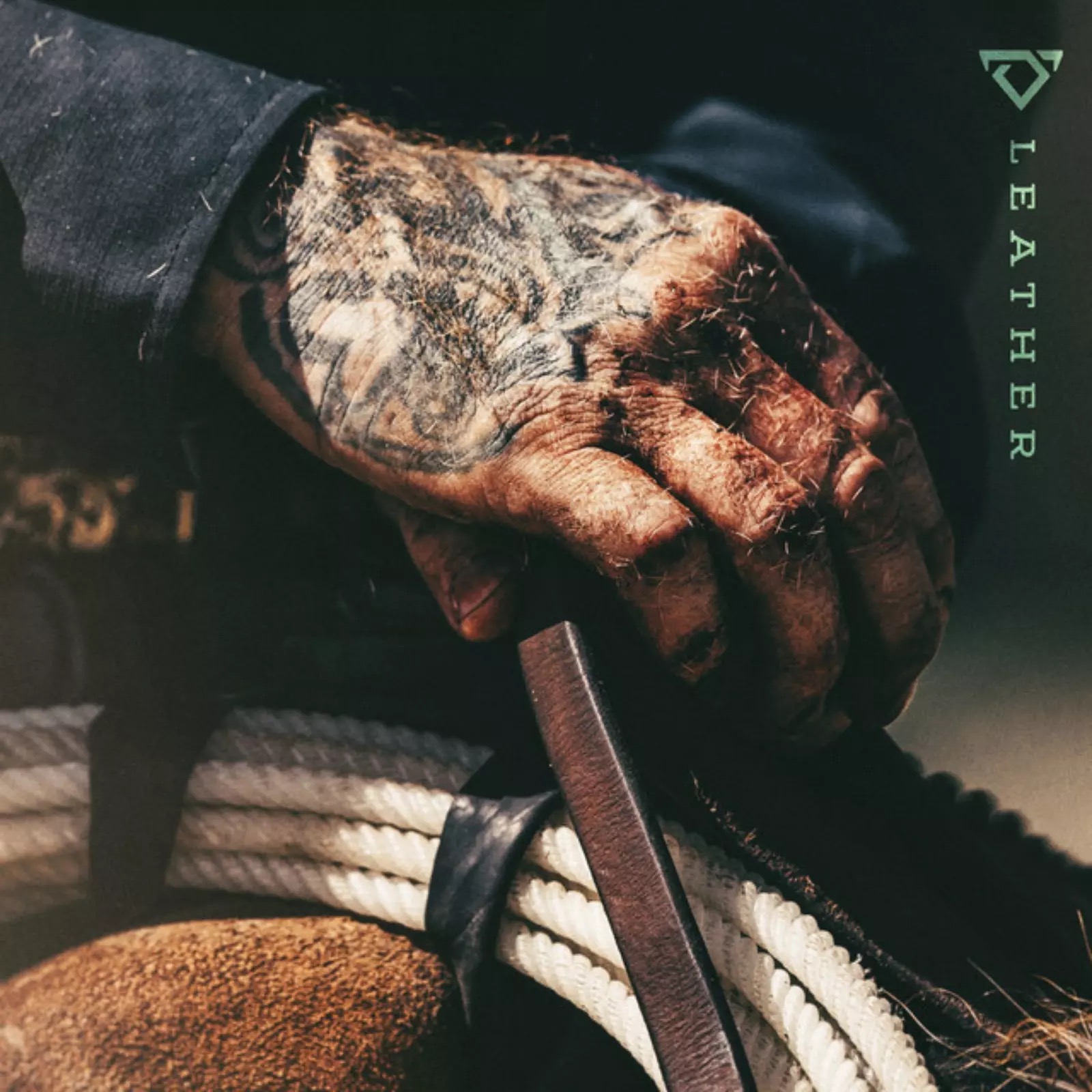 Cody Johnson tattoos: the heavily tattooed hand and visible lettering detail