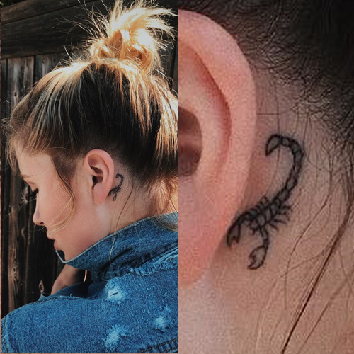 Ireland Baldwin scorpion behind ear tattoo