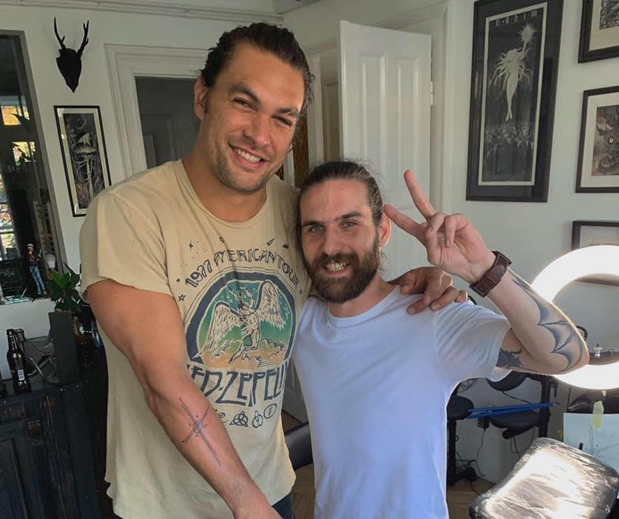 Jason Momoa On the Roam tattoo and arm lettering