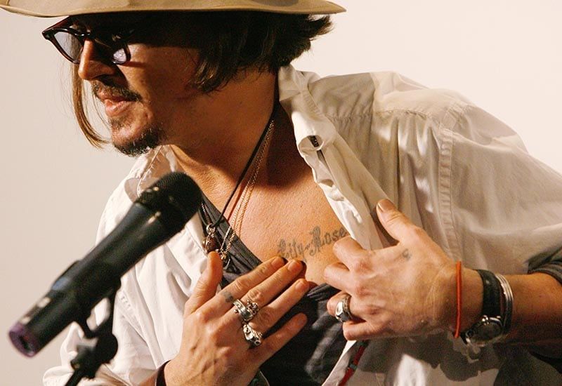 Johnny Depp Lily-Rose chest tattoo