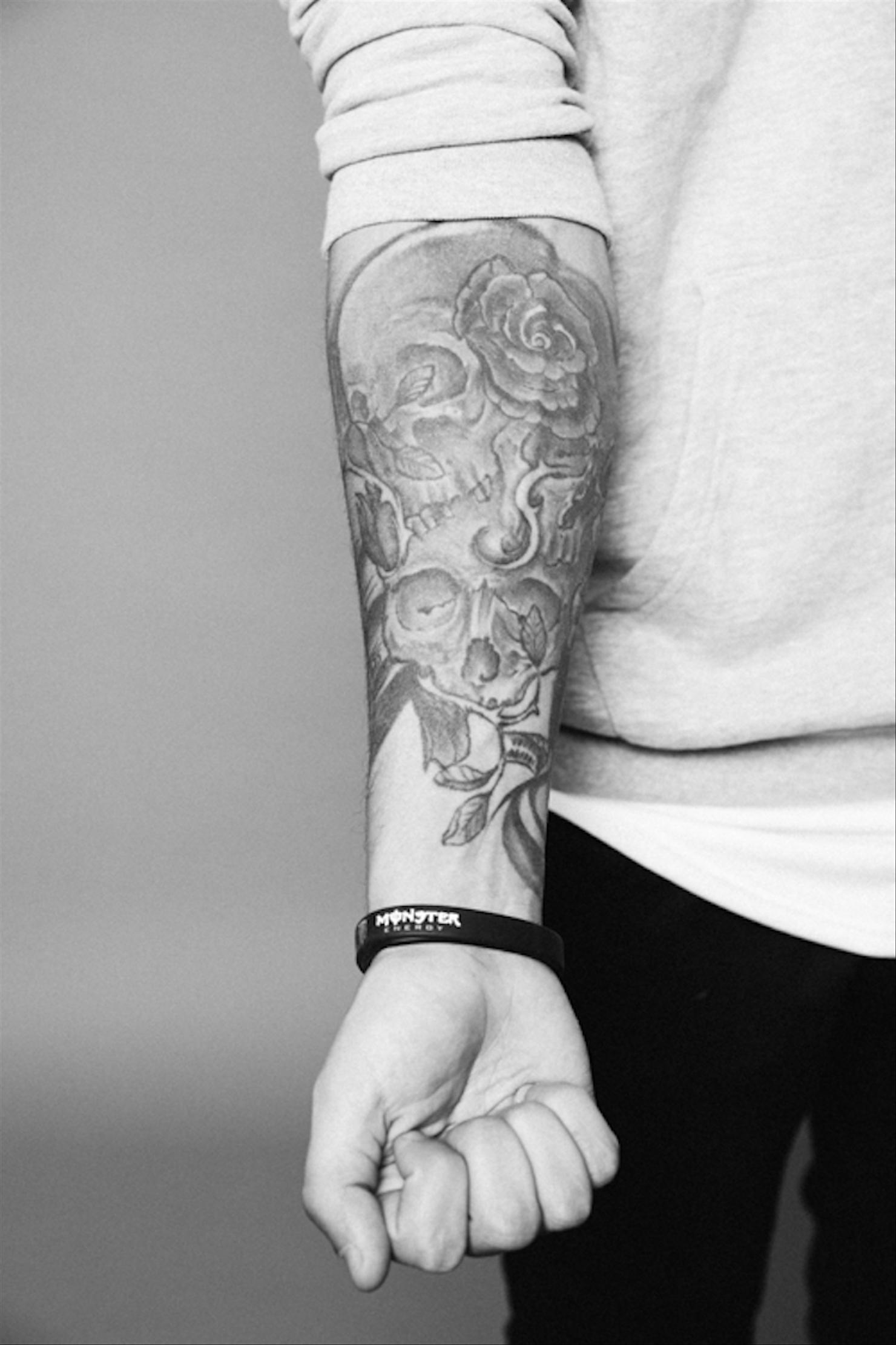 Kane Brown three skulls forearm tattoo
