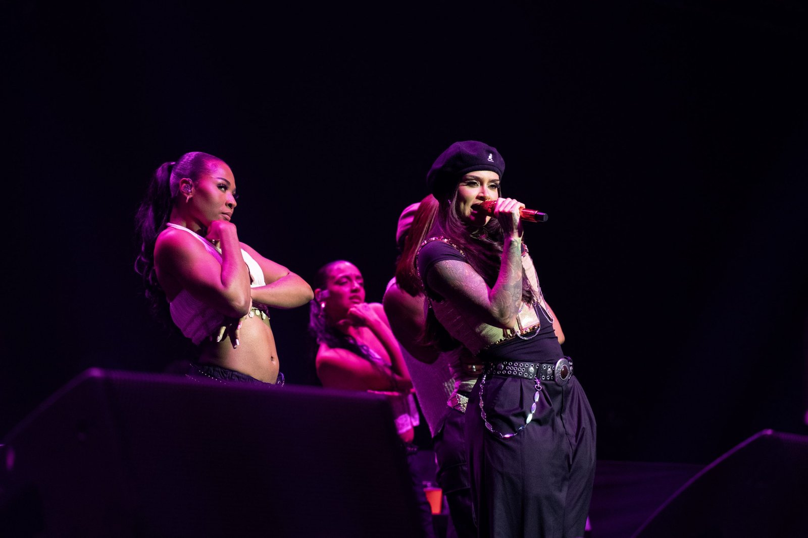 Kehlani showing the hand lotus cover-up tattoo