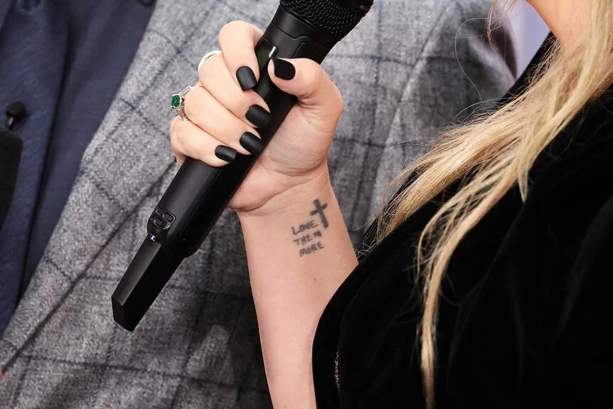 Kelly Clarkson Love Them More wrist tattoo