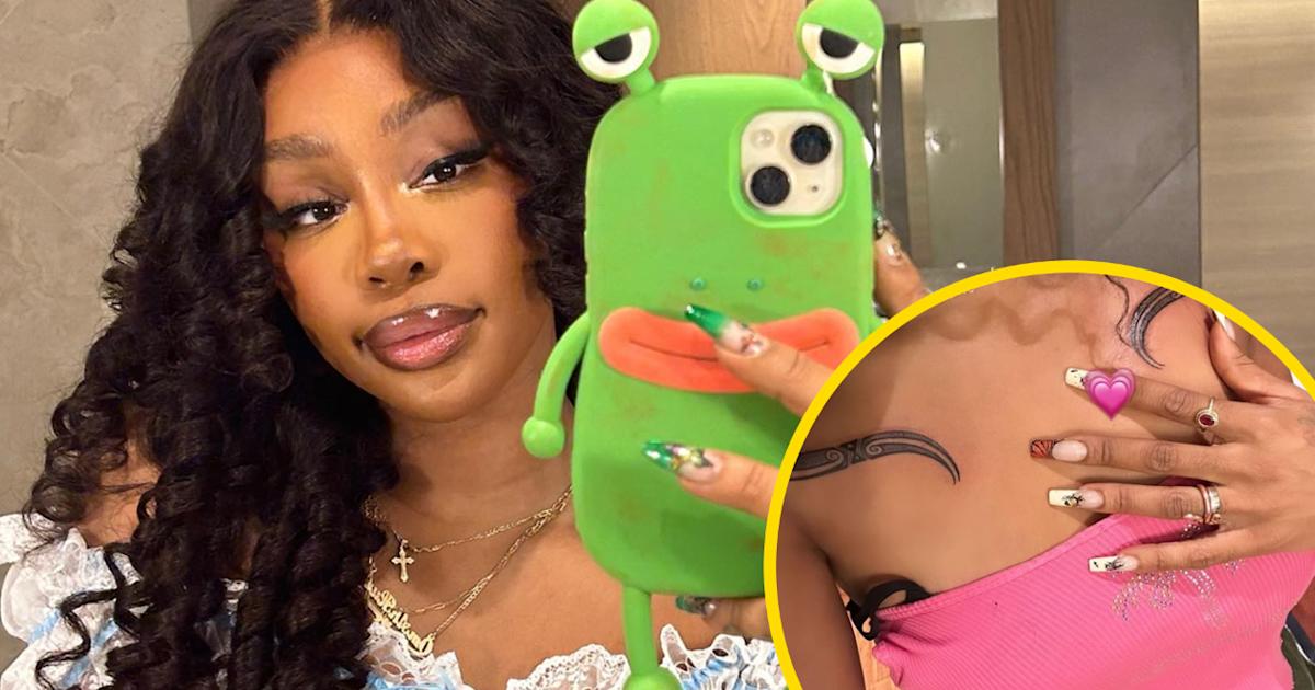 SZA tattoos: clear view of SZA’s kirituhi chest and shoulder tattoo
