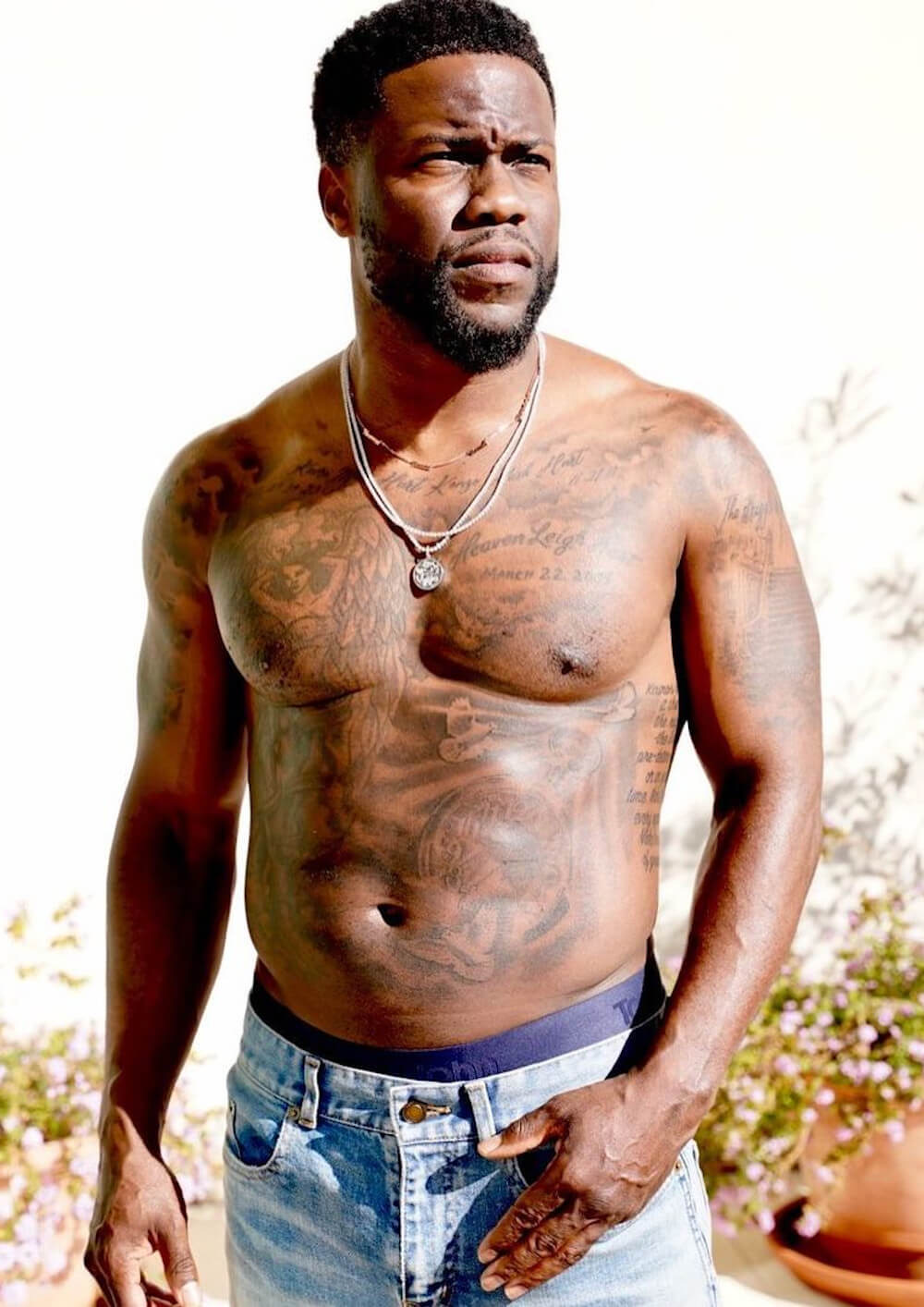 Kevin Hart tattoos: separate high-resolution tattoo guide photograph showing shoulder and upper-body details