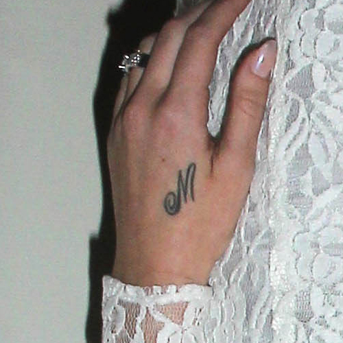 Lana Del Rey M hand tattoo
