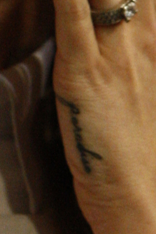 Lana Del Rey Paradise hand tattoo