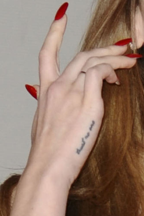 Lana Del Rey Trust No One hand tattoo
