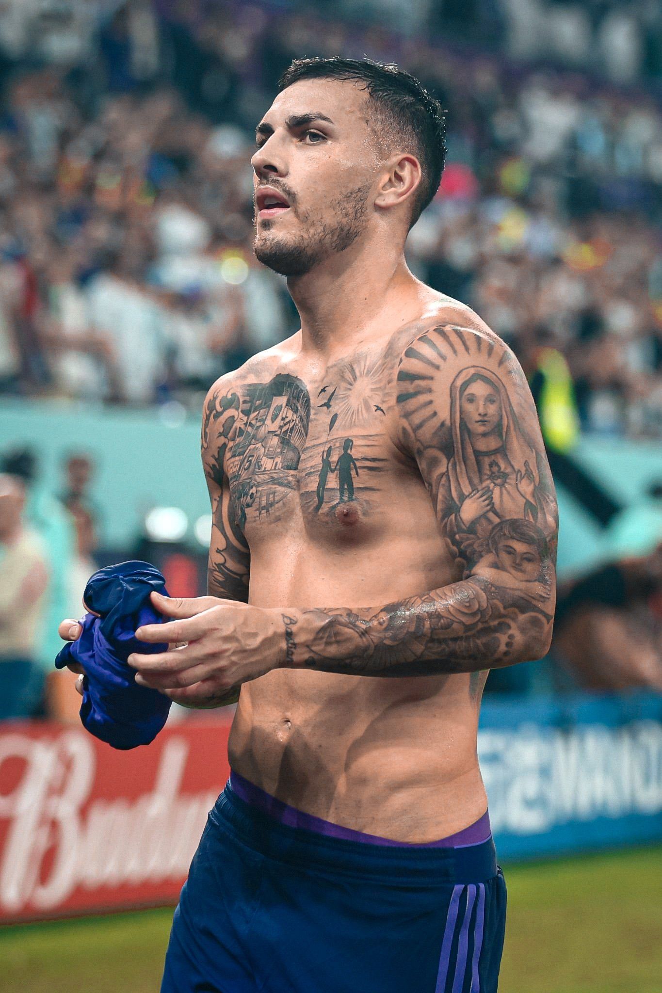 Leandro Paredes religious chest and arm tattoos