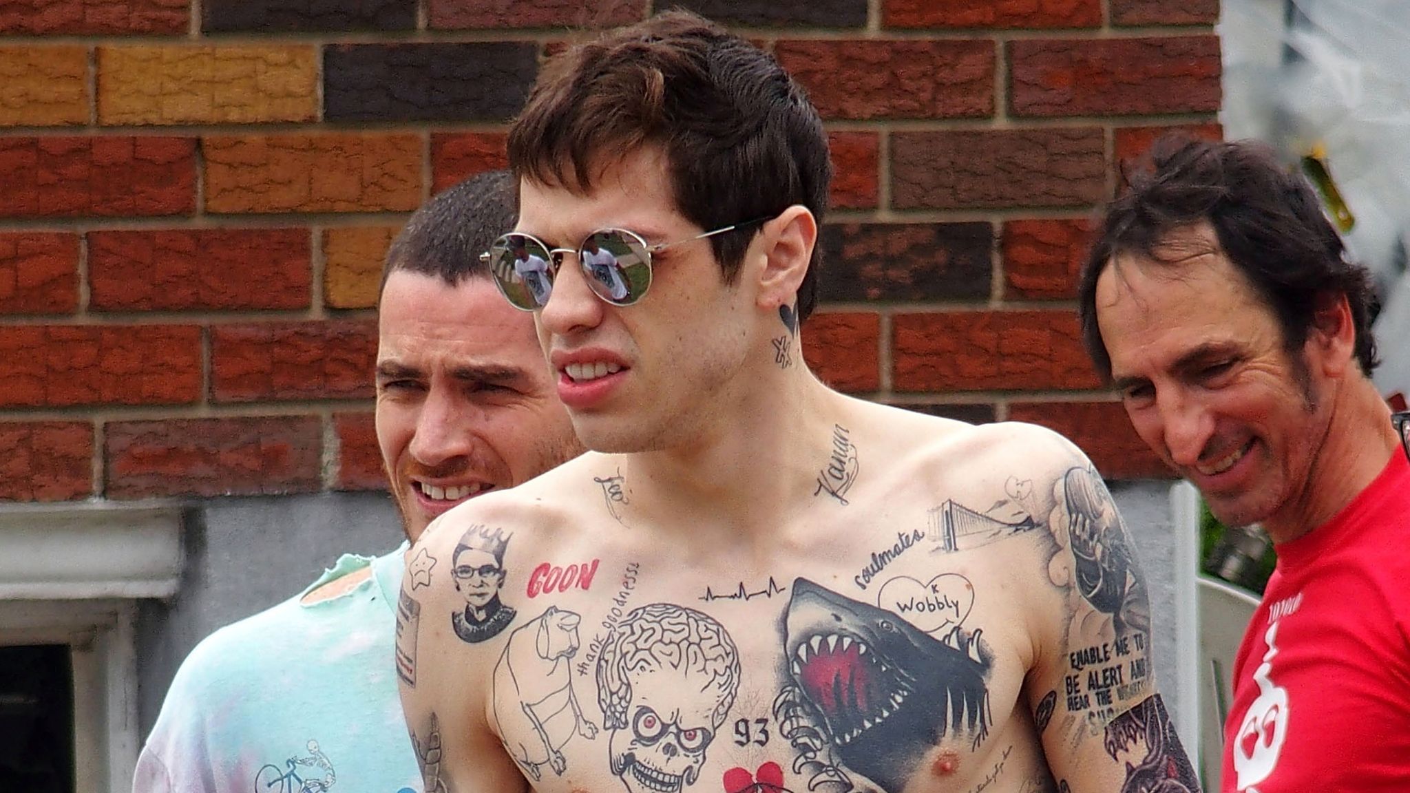Pete Davidson tattoos: SHAOLIN and GOON lettering
