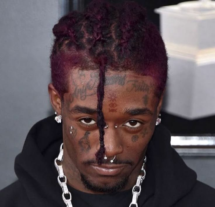 Lil Uzi Vert Faith lettering and facial symbols