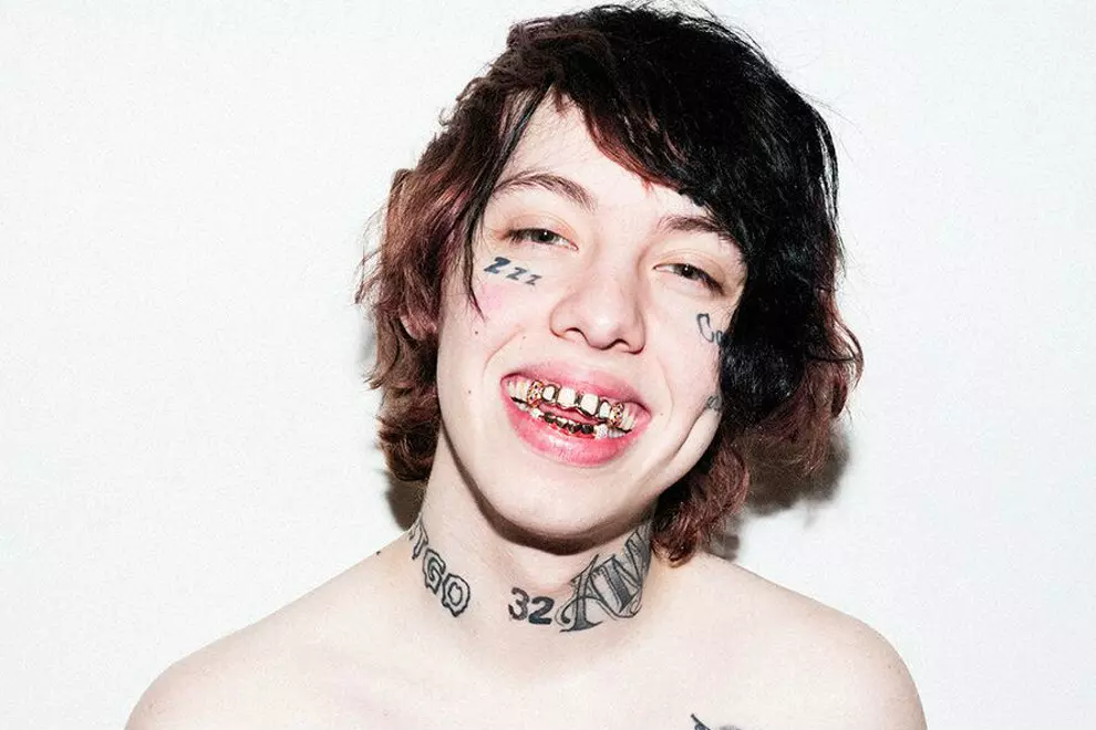 Lil Xan 32 neck and DEC 3 chest tattoos