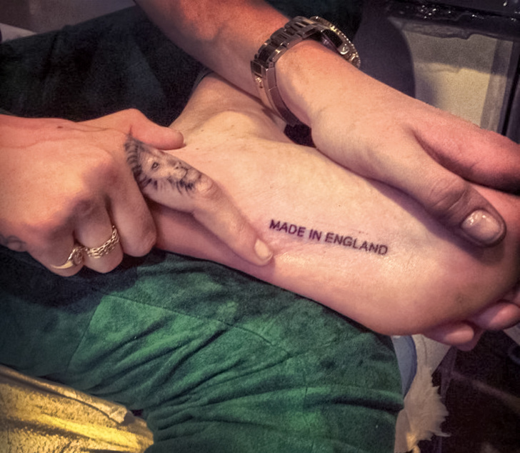 Cara Delevingne Made in England tattoo on her foot