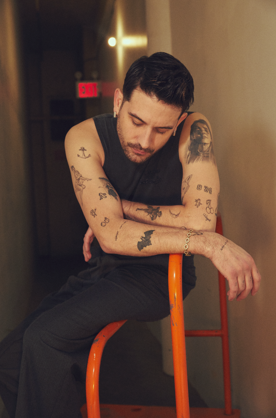 G-Eazy tattoos: close view of visible arm, wrist and neck tattoo details