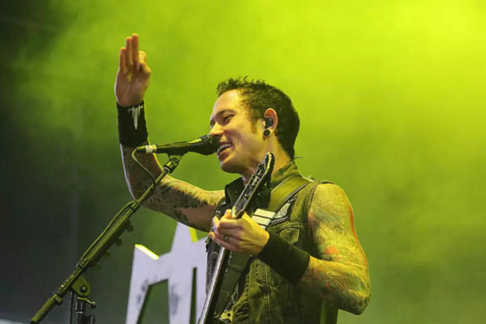 Matt Heafy arm sleeve tattoos onstage